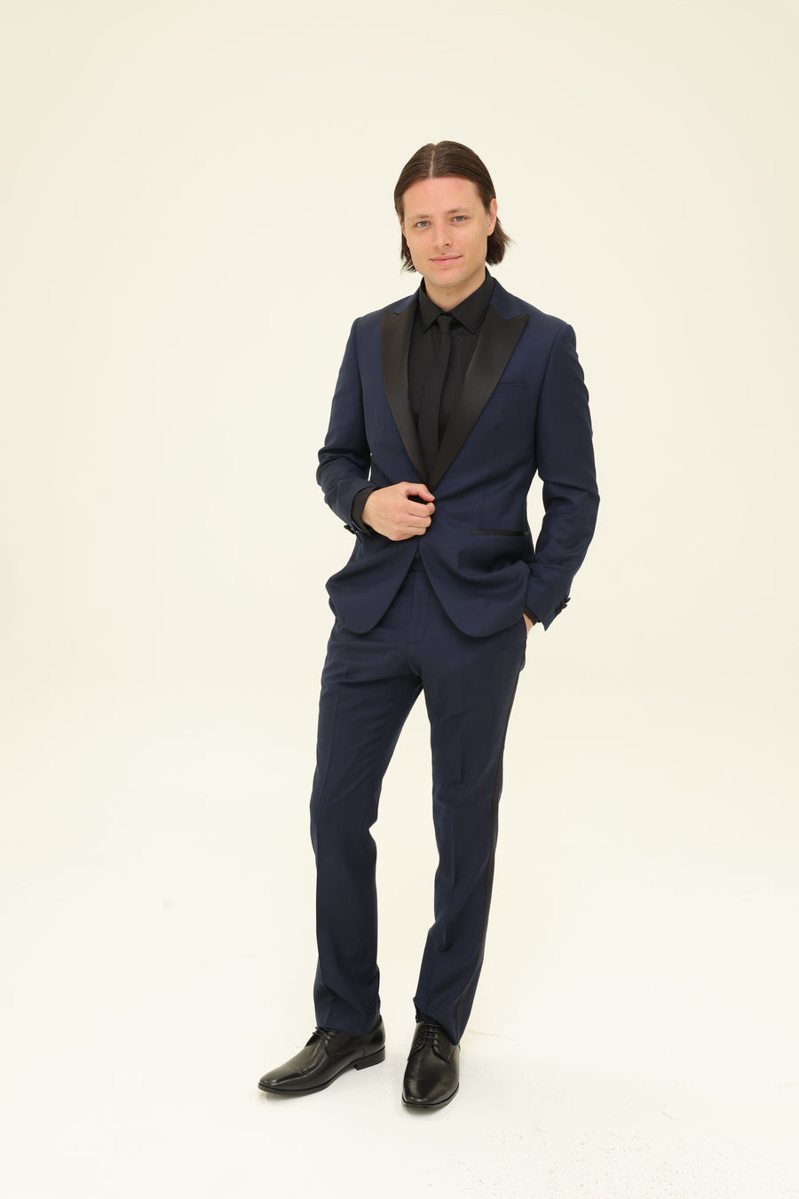 Rent a suit at Klovia. Navy suit with black lapel delivered to your door. Exclusive to Klovia