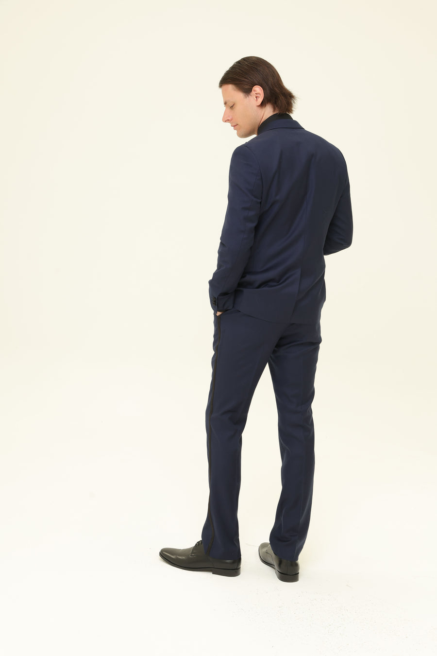 navy suit hire back view